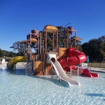 aquatic park slide with dump buckets
