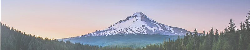 pink and purple sunset behind Mt Hood in Oregon