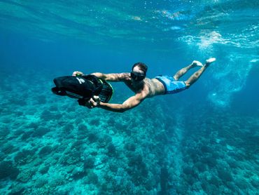 Tahiti sport fishing charter boat underwater scooter activity