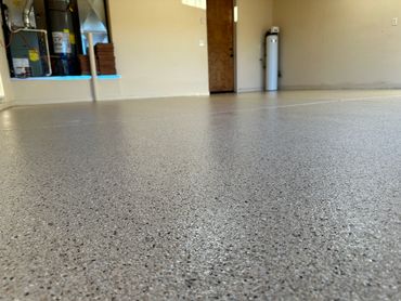 full broadcast of granitex cafe mocha colored flake in a garage