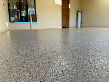 full broadcast of granitex cafe mocha colored flake in garage