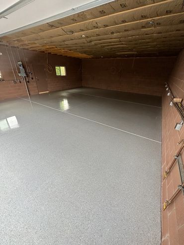 full broadcast of polished collection of Flintstone with a light gray base, in a garage shop.