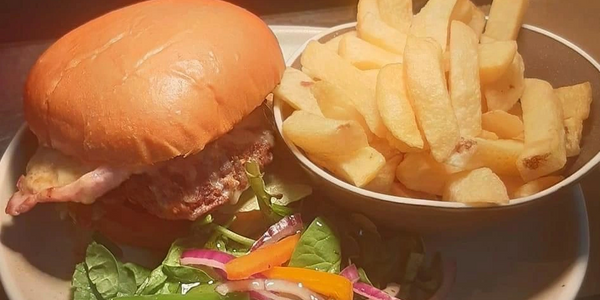 Dirty Burger and chips with a side salad