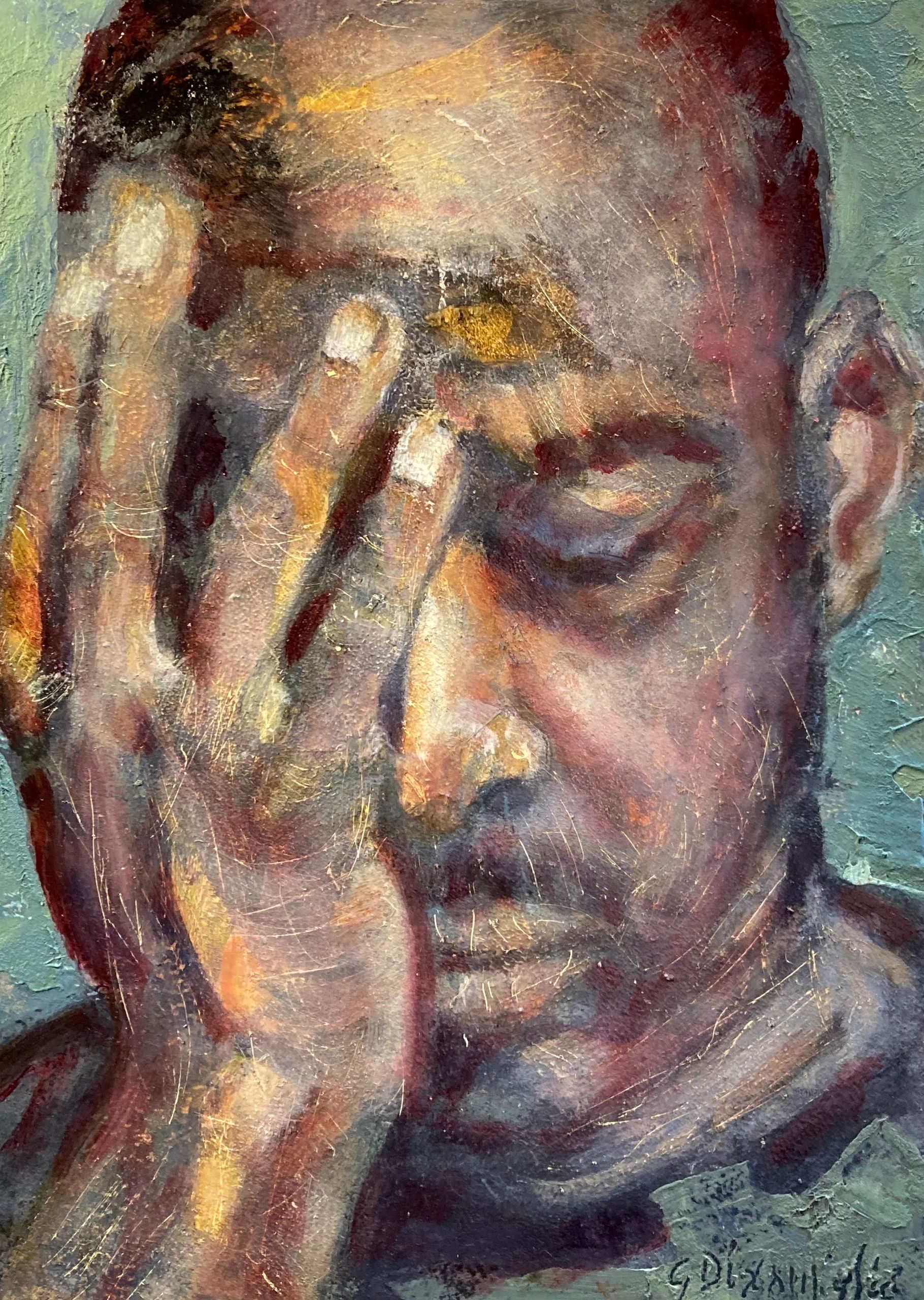 Man holding his face