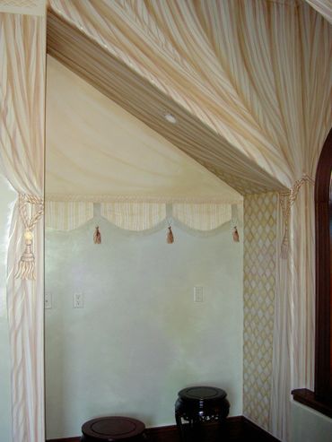 a light and soft color painting on the wall of a bedroom