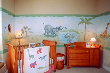 A wall painting of three wild animals in a room