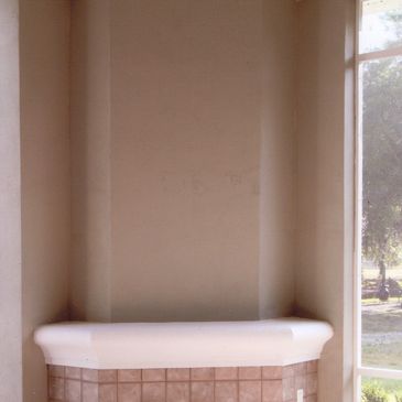 A plain old dusky wall with a white border shelf