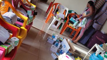 This picture shows a stockroom with a wide range of stationery which has been provided by many spons