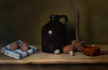 Still life with eggs, jug, wooden mallet, and bowl on a wooden table.