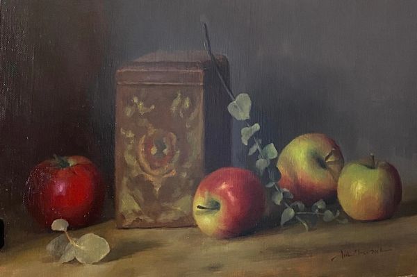 Still life painting of apples, a decorative box, and leaves on a wooden surface.