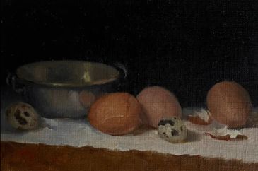 Still life with eggs on a white cloth.