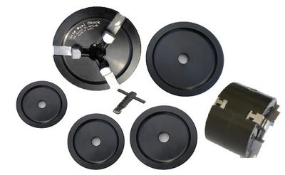 Various lathe chuck jaws and attachments.