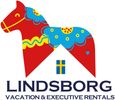 Lindsborg Vacation & Executive Rentals logo includes Swedish Dala horse