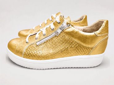 Orthopädischer Schuhe im goldenen Sneaker Design