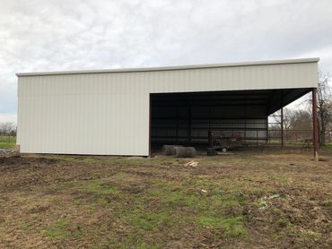 A side view of a completed metal building.
