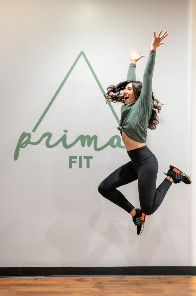 Woman jumping in excitement.