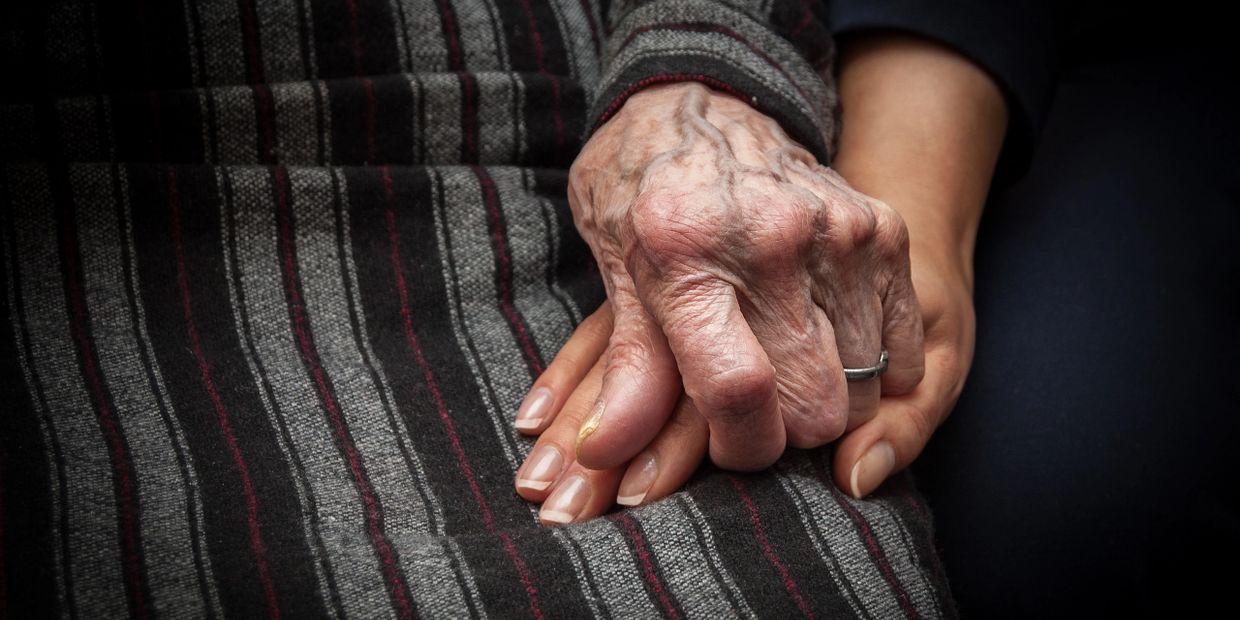 two people holding hands