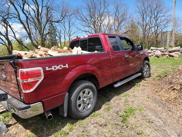 truck full of firewood, firewood delivery