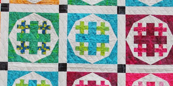 Infuse Joy quilt pattern by Lizard Creek Quilting. Fabric by Island Batik