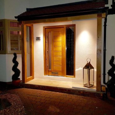 New front porch in Worsley, Manchester, built by Mad Build Co, creating a modern entrance with timber door, lighting and high-quality finish.