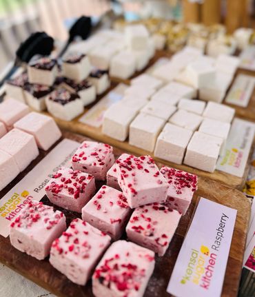 raspberry flavour marshmallows on wooden boards. Rose and strawberry marshmallows on wooden boards