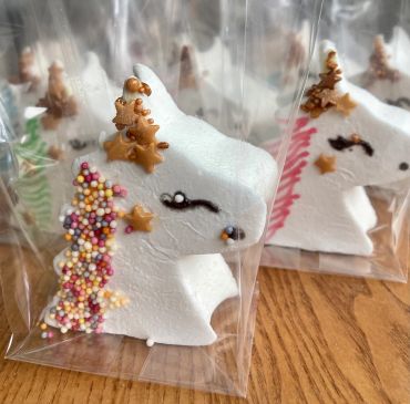 Amazing unicorn marshmallow hand decorated with sprinkles and stars