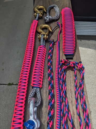 A set of pink paracord straps