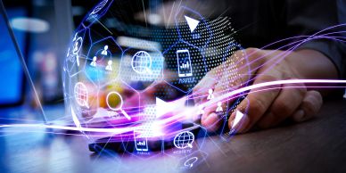 Hand interacting with a digital technology interface representing a technology holding company
