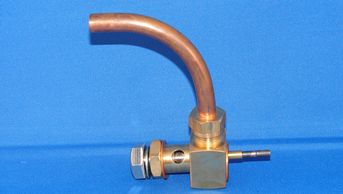Copper pipe valve with a hexagonal nut on a blue background.