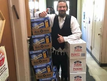 Rabbi Yom Tov Glaser with sponsored Blue Moon Beer donated by MolsonCoors