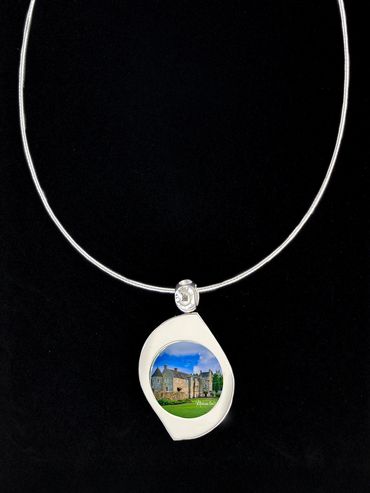 Silver pendant with image of Ferniehirst Castle inserted