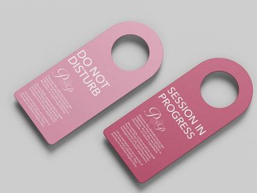 Two pink spa door hangers with messages about privacy and session progress by Kindall Wright - KX Graphic Design.