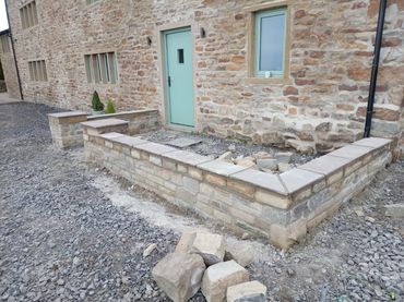 Stone wall around house entrance near Manchester in Altrincham