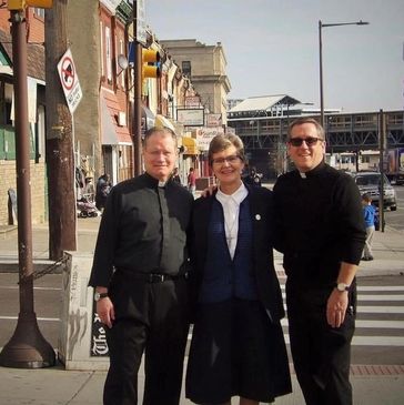 Fr. Joe Devlin, Sr. Ann Raymond Welte, IHM and Fr. Bill Murphy  outside original location at "G" St.