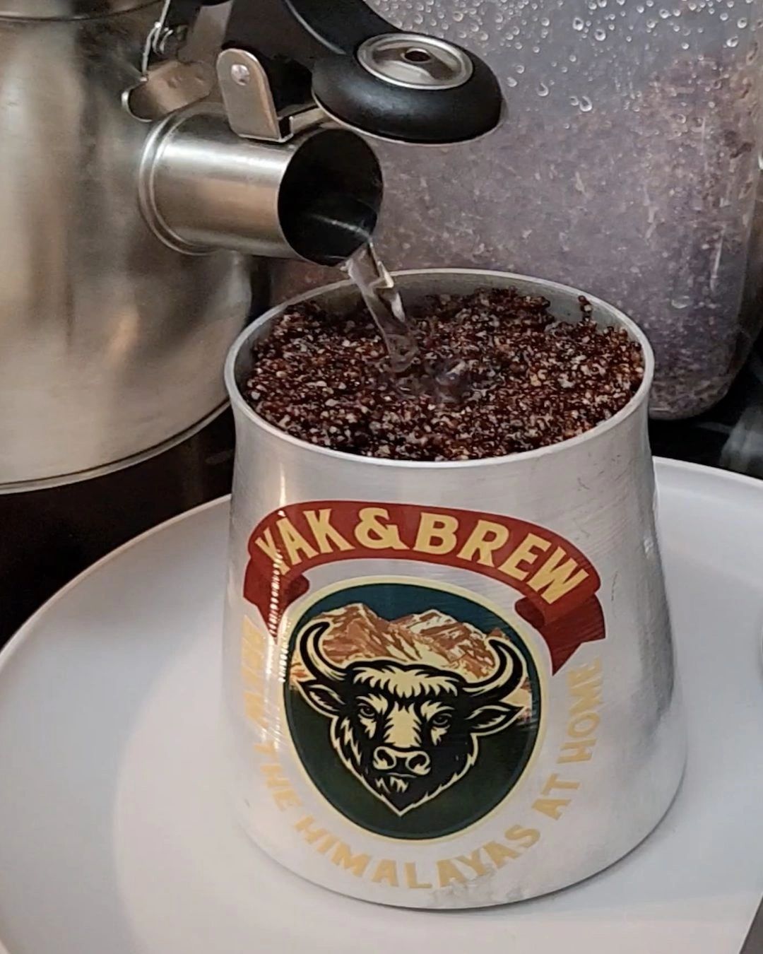 Hot water poured over fermented millet in a Yak&Brew tongba vessel