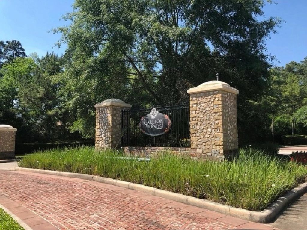 The front gate at Carlton Woods in The Woodlands, Texas.