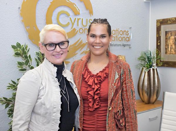 Branding and Design Consultant with CEO in the office