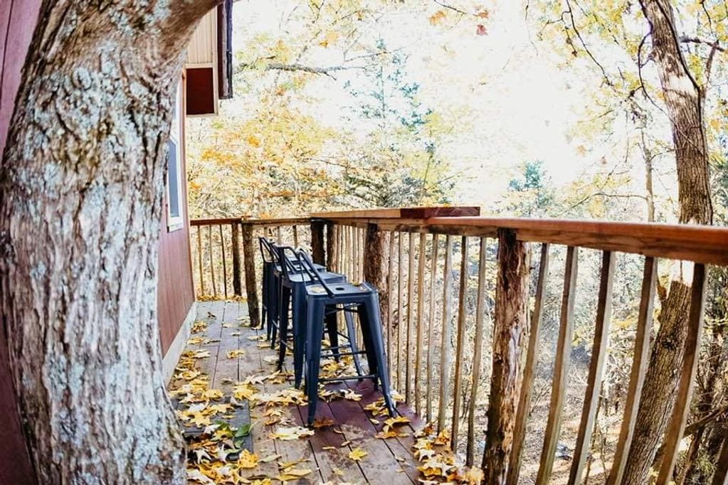 Hickory treehouse at EarthJOY village outdoor bar area with propane grill.