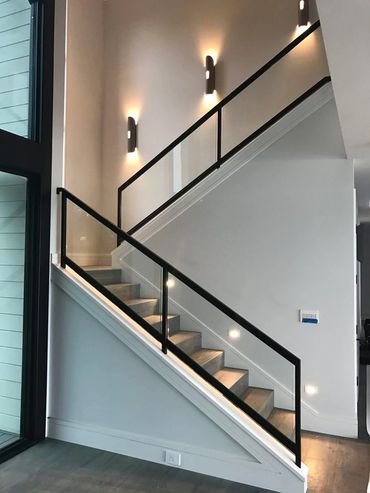 stairs with glass railings