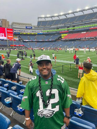 Randy Bowen smiling at Gillett stadium in Foxborough, MA, United States.