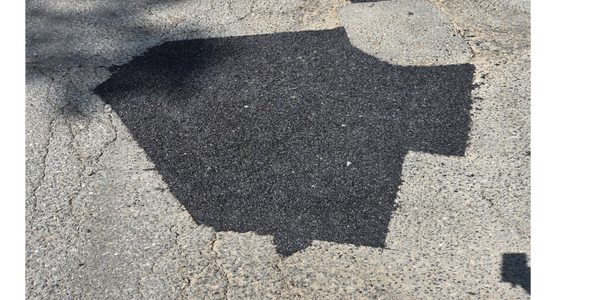 Professional asphalt pothole repair
