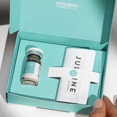 Juvederm product in a teal box.