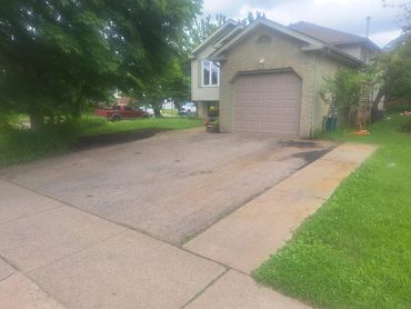 Suburban house with garage and driveway.