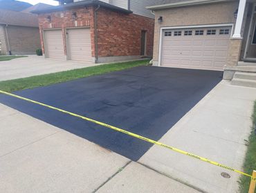 Finished driveway sealing project in Waterloo Region