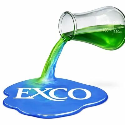 Green liquid pouring from a beaker into a blue puddle labeled EXCO.