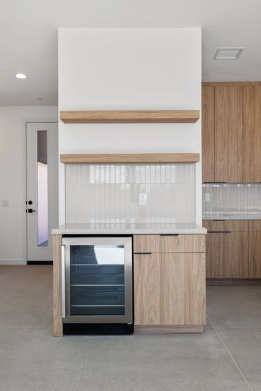 Olmo Miele by Salt used for custom cabinets in modern kitchen design for beautiful Yucca Valley home