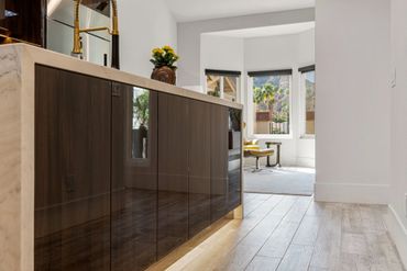 Integrated custom cabinets in Olmo Gloss on a island for modern kitchen design