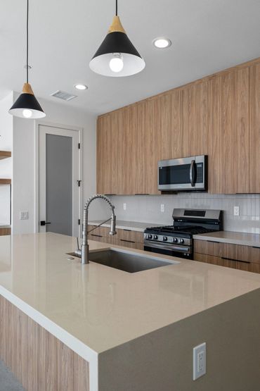 Olmo Miele by Salt used for custom cabinets in modern kitchen design for beautiful Yucca Valley home