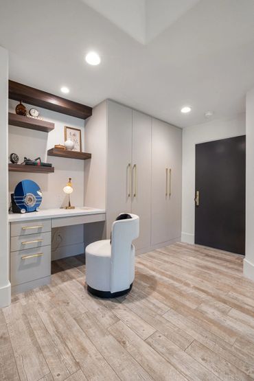 Beautiful home design with integrated floating custom cabinets finished in Buff Linen by Salt