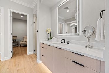 Modern bath/vanity design with integrated custom cabinets in Khaki Linen by Salt for Indio home.